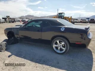 ✅ 2014 Dodge Challenger R/T • VIN: 2C3CDYBT2EH298517 • Lot: 64642864. Wystawiony na Copart z przebiegiem 97 070 mil. Bezpłatny archiwum sprzedaży aukcyjnych z USA i szczegółowy raport historii pojazdu na DreamBid. Zdjęcie 2.