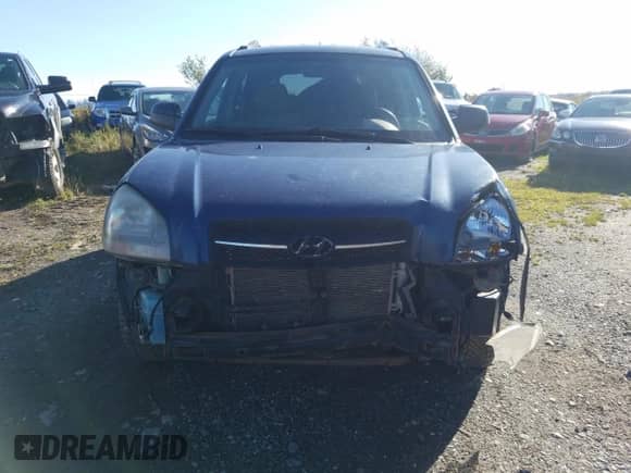 2006 Hyundai Tucson GL z VIN KM8JM72B76U405771, wystawiony jako Copart lot #76751074 z przebiegiem 233 649 mil mil oraz Szkoda całkowita • Salvage title. Historia ofert i sprzedaży dostępna na DreamBid. Obrazek 5.