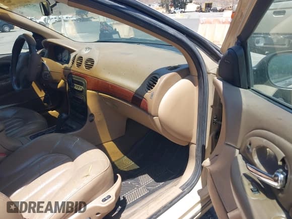 ✅ 1999 Chrysler 300M M • VIN: 2C3HE66G0XH591016 • Lot: 42715273. Wystawiony na IAAI z przebiegiem 121 410 mil. Bezpłatny archiwum sprzedaży aukcyjnych z USA i szczegółowy raport historii pojazdu na DreamBid. Zdjęcie 5.