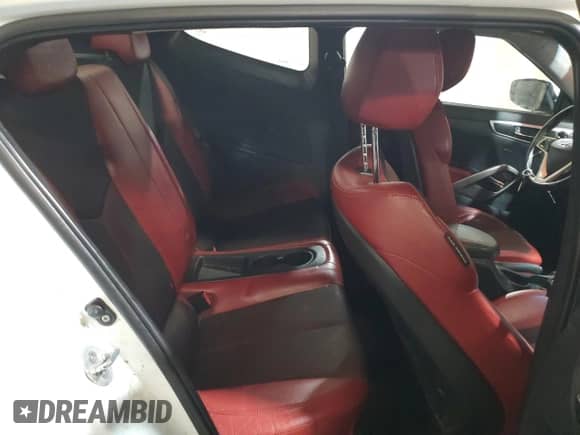 2012 Hyundai Veloster w/Red Int z VIN KMHTC6AD7CU030162, wystawiony jako Copart lot #73692164 z przebiegiem 101 371 mil mil oraz Szkoda całkowita • Salvage title. Historia ofert i sprzedaży dostępna na DreamBid. Obrazek 10.