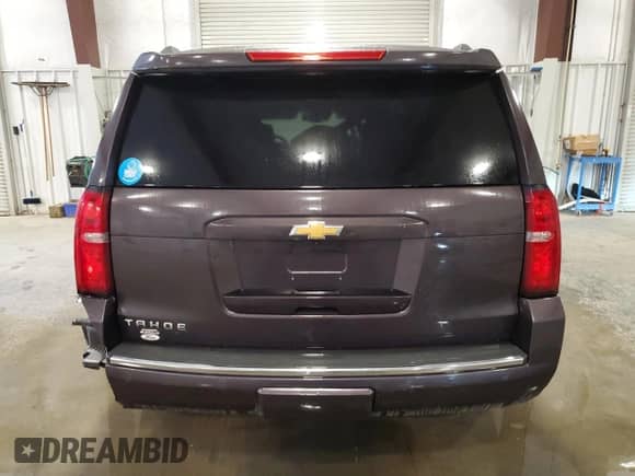 2016 Chevrolet Tahoe LTZ with VIN 1GNSKCKC5GR107425, listed as a Copart auction lot 81219225 with 130,322 mi miles and Salvage title. Bid and sale history available at DreamBid. Image 6.