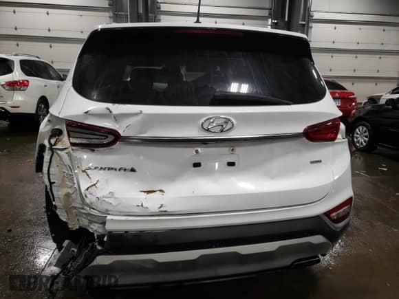 2019 Hyundai Santa Fe SE z VIN 5NMS2CAD6KH121639, wystawiony jako Copart lot #70541702 z przebiegiem 31 689 mil mil oraz . Historia ofert i sprzedaży dostępna na DreamBid. Obrazek 6.