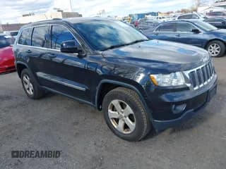 ✅ 2013 Jeep Grand Cherokee Laredo • VIN: 1C4RJFAG7DC610355 • Lot: 43624738. Listed on IAAI with 197,671 mi. Free auction sales archive from the USA and detailed vehicle history report at DreamBid. Image 1.