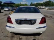 ✅ 1998 Lincoln Continental • VIN: 1LNFM97V4WY686733 • Lot: 65069875. Wystawiony na Copart z przebiegiem 196 760 mil. Bezpłatny archiwum sprzedaży aukcyjnych z USA i szczegółowy raport historii pojazdu na DreamBid. Zdjęcie 6.