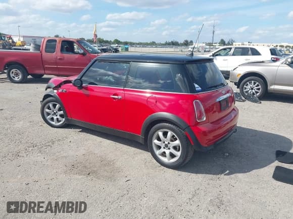 ✅ 2006 MINI Hardtop • VIN: WMWRC33526TK18176 • Lot: 41643771. Listed on IAAI with 115,778 mi. Free auction sales archive from the USA and detailed vehicle history report at DreamBid. Image 3.