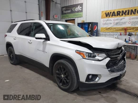 2019 Chevrolet Traverse LT Cloth z VIN 1GNEVGKW1KJ298306, wystawiony jako IAAI lot #43302460 z przebiegiem 76 785 mil mil oraz . Historia ofert i sprzedaży dostępna na DreamBid. Obrazek 1.