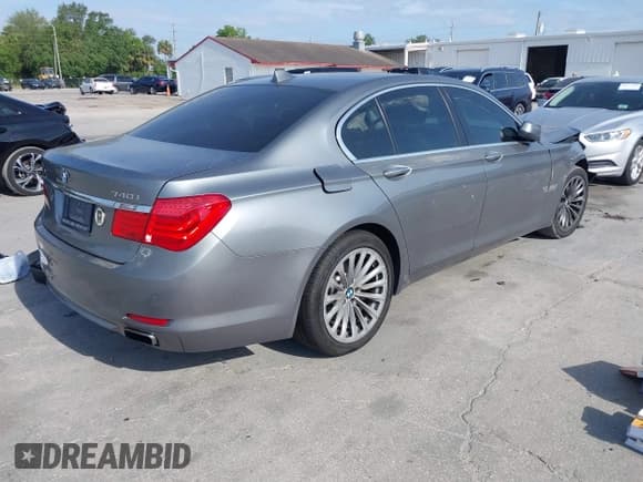 ✅ 2012 BMW 7 Series 740i • VIN: WBAKA4C52CDS99456 • Lot: 42104455. Listed on IAAI with 135,817 mi. Free auction sales archive from the USA and detailed vehicle history report at DreamBid. Image 4.