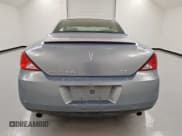 ✅ 2007 Pontiac G6 GT • VIN: 1G2ZH361874166985 • Lot: 68366935. Wystawiony na Copart z przebiegiem 152 808 mil. Bezpłatny archiwum sprzedaży aukcyjnych z USA i szczegółowy raport historii pojazdu na DreamBid. Zdjęcie 6.