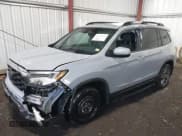 ✅ 2022 Honda Passport EX-L • VIN: 5FNYF7H52NB000679 • Lot: 41449757. Listed on IAAI with 38,672 mi. Free auction sales archive from the USA and detailed vehicle history report at DreamBid. Image 2.