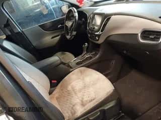 2018 Chevrolet Equinox LS z VIN 3GNAXHEV7JS568914, wystawiony jako IAAI lot #43582395 z przebiegiem 189 385 mil mil oraz . Historia ofert i sprzedaży dostępna na DreamBid. Obrazek 5.