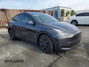 ✅ 2025 Tesla Model Y Long Range • VIN: 7SAYGDEE4SF278238 • Lot: 92206535. Listed on Copart with 5,710 mi. Free auction sales archive from the USA and detailed vehicle history report at DreamBid. Image 4.