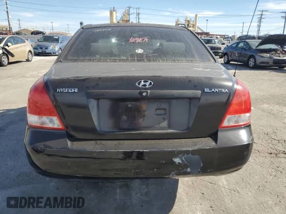 2003 Hyundai Elantra GLS with VIN KMHDN45D63U675382, listed as a Copart auction lot 76012974 with 140,218 mi miles and Salvage title. Bid and sale history available at DreamBid. Image 6.
