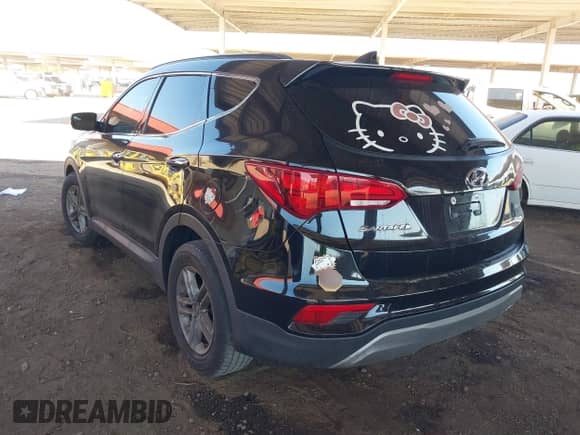 2018 Hyundai Santa Fe 2.4L z VIN 5NMZU3LB8JH066582, wystawiony jako IAAI lot #43283643 z przebiegiem 117 648 mil mil oraz . Historia ofert i sprzedaży dostępna na DreamBid. Obrazek 3.