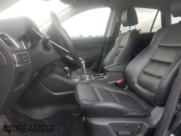 ✅ 2016 Mazda CX-5 Grand Touring • VIN: JM3KE4DY2G0879309 • Lot: 93081915. Wystawiony na Copart z przebiegiem 48 900 mil. Bezpłatny archiwum sprzedaży aukcyjnych z USA i szczegółowy raport historii pojazdu na DreamBid. Zdjęcie 7.