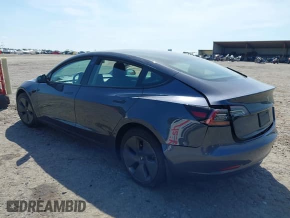 ✅ 2023 Tesla Model 3 • VIN: 5YJ3E1EA8PF400213 • Lot: 42117720. Listed on IAAI with 54,529 mi. Free auction sales archive from the USA and detailed vehicle history report at DreamBid. Image 3.