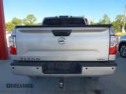 ✅ 2017 Nissan Titan Platinum Reserve • VIN: 1N6AA1E68HN542396 • Lot: 43688877. Listed on IAAI with 124,644 mi. Free auction sales archive from the USA and detailed vehicle history report at DreamBid. Image 16.