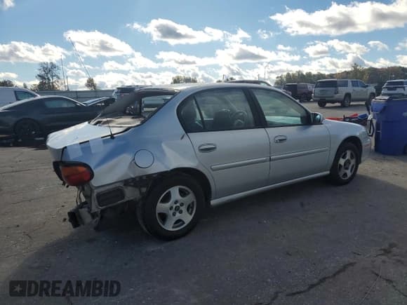 ✅ 2003 Chevrolet Malibu LS • VIN: 1G1NE52J83M673974 • Lot: 82691405. Listed on Copart with 226,857 mi. Free auction sales archive from the USA and detailed vehicle history report at DreamBid. Image 3.