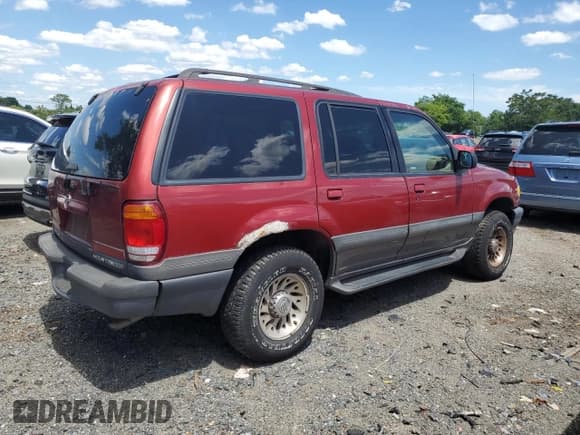 ✅ 2000 Mercury Mountaineer • VIN: 4M2ZU76E8YUJ09828 • Lot: 62706994. Listed on Copart with 215,356 mi. Free auction sales archive from the USA and detailed vehicle history report at DreamBid. Image 3.