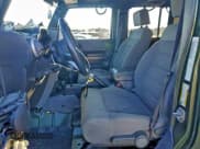 ✅ 2008 Jeep Wrangler Unlimited Sahara • VIN: 1J8GA59148L553239 • Lot: 94098485. Listed on Copart with 136,730 mi. Free auction sales archive from the USA and detailed vehicle history report at DreamBid. Image 7.