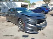 ✅ 2015 Dodge Charger SXT • VIN: 2C3CDXHG5FH825469 • Lot: 43511613. Listed on IAAI with 97,272 mi. Free auction sales archive from the USA and detailed vehicle history report at DreamBid. Image 1.