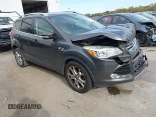 ✅ 2015 Ford Escape Titanium • VIN: 1FMCU0JX8FUB71346 • Lot: 43558511. Listed on IAAI with 127,729 mi. Free auction sales archive from the USA and detailed vehicle history report at DreamBid. Image 1.