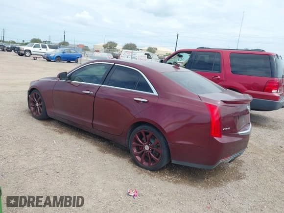 ✅ 2014 Cadillac ATS Performance RWD • VIN: 1G6AC5SXXE0185431 • Lot: 42785002. Listed on IAAI with 138,543 mi. Free auction sales archive from the USA and detailed vehicle history report at DreamBid. Image 3.
