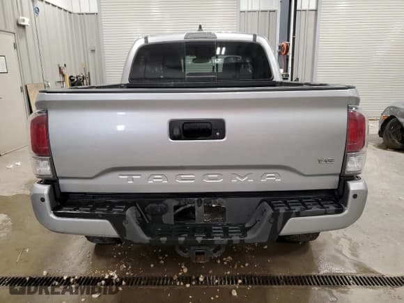 ✅ 2023 Toyota Tacoma SR • VIN: 3TYCZ5AN3PT152070 • Lot: 70323625. Listed on Copart with 134,996 mi. Free auction sales archive from the USA and detailed vehicle history report at DreamBid. Image 6.