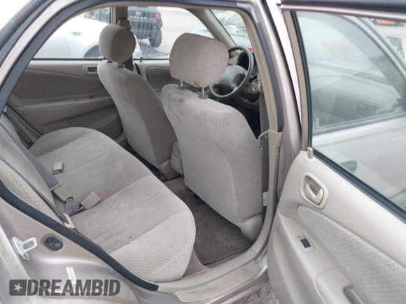 ✅ 1999 Toyota Corolla VE • VIN: 2T1BR12E2XC142458 • Lot: 42879723. Listed on IAAI with 140,141 mi. Free auction sales archive from the USA and detailed vehicle history report at DreamBid. Image 8.