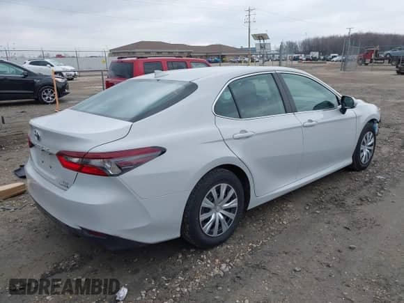 2023 Toyota Camry Hybrid LE with VIN 4T1C31AK8PU052114, listed as a IAAI auction lot 41982736 with 81,059 mi miles and . Bid and sale history available at DreamBid. Image 4.
