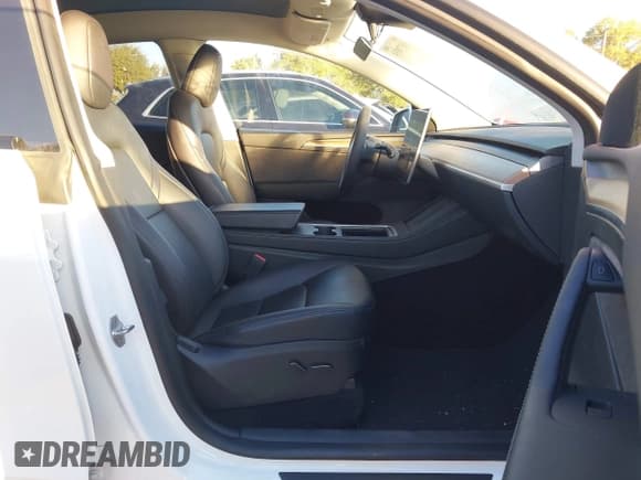 ✅ 2023 Tesla Model Y Long Range • VIN: 7SAYGDEE2PA058634 • Lot: 43570934. Listed on IAAI with 40,478 mi. Free auction sales archive from the USA and detailed vehicle history report at DreamBid. Image 5.