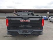 ✅ 2021 GMC Sierra 1500 AT4 • VIN: 1GTU9EET0MZ328317 • Лот: 43750506. Опубликован ранее на IAAI с пробегом 64 309 миль. Бесплатный доступ к архиву аукционных продаж из США и подробный отчёт об истории автомобиля на DreamBid. Изображение 17.