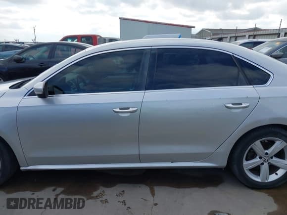 ✅ 2013 Volkswagen Passat SE • VIN: 1VWBP7A39DC034221 • Lot: 43707852. Listed on IAAI with 159,151 mi. Free auction sales archive from the USA and detailed vehicle history report at DreamBid. Image 14.