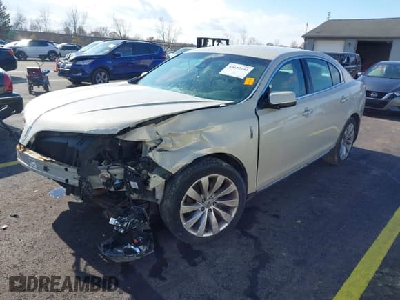 ✅ 2015 Lincoln MKS • VIN: 1LNHL9DK8FG607141 • Lot: 43612263. Listed on IAAI with 72,529 mi. Free auction sales archive from the USA and detailed vehicle history report at DreamBid. Image 2.