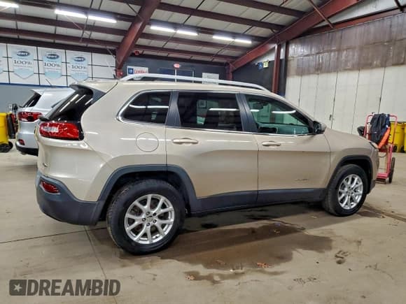 ✅ 2014 Jeep Cherokee Latitude • VIN: 1C4PJMCB3EW186248 • Lot: 96553205. Wystawiony na Copart z przebiegiem 170 423 mil. Bezpłatny archiwum sprzedaży aukcyjnych z USA i szczegółowy raport historii pojazdu na DreamBid. Zdjęcie 3.