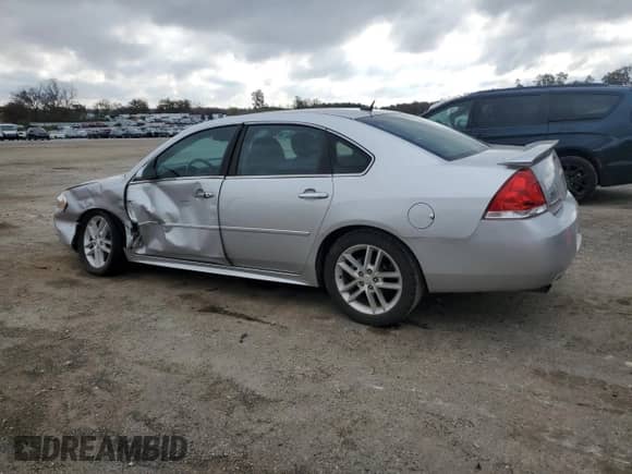 2012 Chevrolet Impala LTZ with VIN 2G1WC5E33C1257902, listed as a Copart auction lot 90680365 with 68,296 mi miles and Non repairable. Bid and sale history available at DreamBid. Image 2.