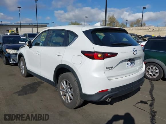 ✅ 2023 Mazda CX-5 S • VIN: JM3KFBAM3P0253948 • Лот: 43743970. Опубликован ранее на IAAI с пробегом 14 355 миль. Бесплатный доступ к архиву аукционных продаж из США и подробный отчёт об истории автомобиля на DreamBid. Изображение 3.