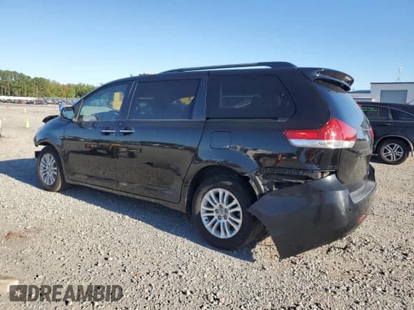 ✅ 2011 Toyota Sienna XLE • VIN: 5TDYK3DC2BS132468 • Lot: 82339955. Listed on Copart with 220,109 mi. Free auction sales archive from the USA and detailed vehicle history report at DreamBid. Image 2.
