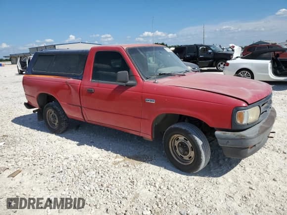 ✅ 1994 Mazda B-Series • VIN: 4F4CR12AXRTN07635 • Lot: 66788284. Listed on Copart with 255,020 mi. Free auction sales archive from the USA and detailed vehicle history report at DreamBid. Image 4.