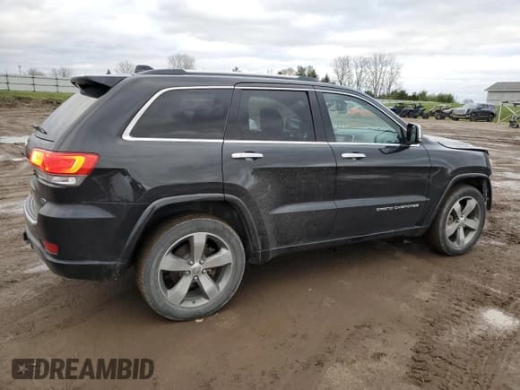 ✅ 2015 Jeep Grand Cherokee Overland • VIN: 1C4RJFCM4FC706109 • Lot: 81279744. Listed on Copart with 160,295 mi. Free auction sales archive from the USA and detailed vehicle history report at DreamBid. Image 3.