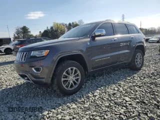 ✅ 2015 Jeep Grand Cherokee Overland • VIN: 1C4RJFCMXFC237723 • Lot: 50318145. Listed on Copart with 103,741 mi. Free auction sales archive from the USA and detailed vehicle history report at DreamBid. Image 1.