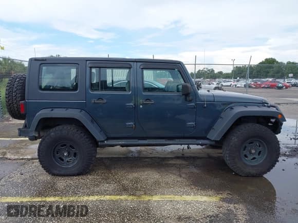 ✅ 2008 Jeep Wrangler Unlimited X • VIN: 1J4GA39198L529900 • Lot: 43056730. Listed on IAAI with 145,039 mi. Free auction sales archive from the USA and detailed vehicle history report at DreamBid. Image 13.
