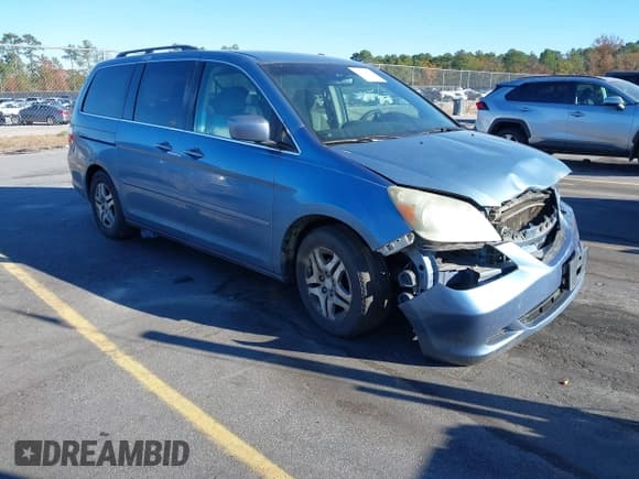 ✅ 2007 Honda Odyssey EX • VIN: 5FNRL38467B036519 • Lot: 43702862. Listed on IAAI with 218,014 mi. Free auction sales archive from the USA and detailed vehicle history report at DreamBid. Image 1.