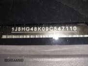 ✅ 2009 Jeep Commander Sport • VIN: 1J8HG48K09C547110 • Lot: 41768609. Listed on IAAI with 200,402 mi. Free auction sales archive from the USA and detailed vehicle history report at DreamBid. Image 18.