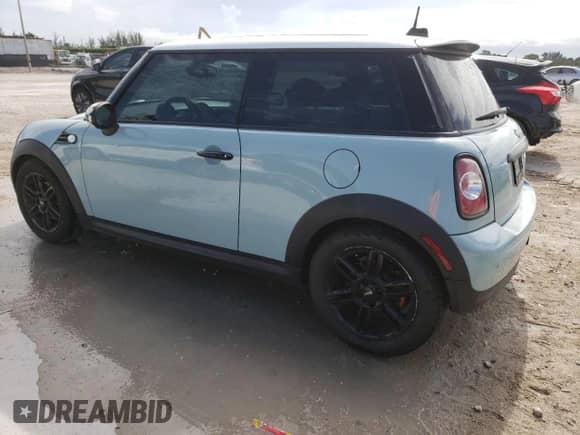 2012 MINI Hardtop with VIN WMWSU3C52CT367682, listed as a Copart auction lot 63045965 with 124,683 mi miles and Salvage title. Bid and sale history available at DreamBid. Image 2.