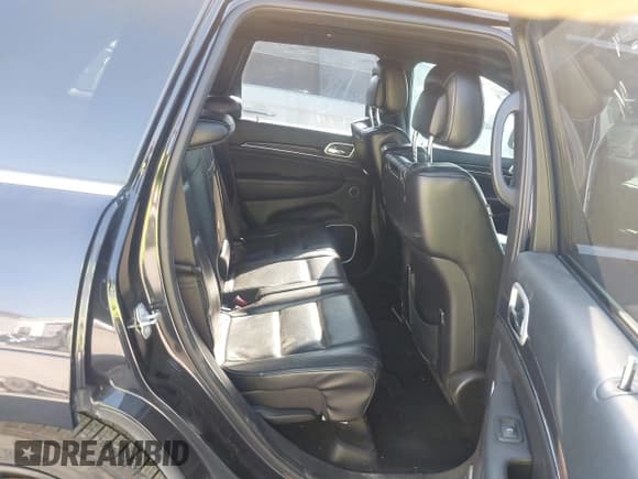 ✅ 2016 Jeep Grand Cherokee Overland • VIN: 1C4RJFCT6GC471673 • Lot: 40584190. Listed on IAAI with 128,482 mi. Free auction sales archive from the USA and detailed vehicle history report at DreamBid. Image 8.