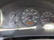 ✅ 2002 Mazda Protege DX • VIN: JM1BJ225121602980 • Lot: 73161834. Wystawiony na Copart z przebiegiem 77 314 mil. Bezpłatny archiwum sprzedaży aukcyjnych z USA i szczegółowy raport historii pojazdu na DreamBid. Zdjęcie 9.