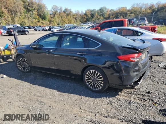 ✅ 2017 Ford Fusion Titanium • VIN: 3FA6P0K91HR102362 • Lot: 87445665. Wystawiony na Copart z przebiegiem 67 893 mil. Bezpłatny archiwum sprzedaży aukcyjnych z USA i szczegółowy raport historii pojazdu na DreamBid. Zdjęcie 2.