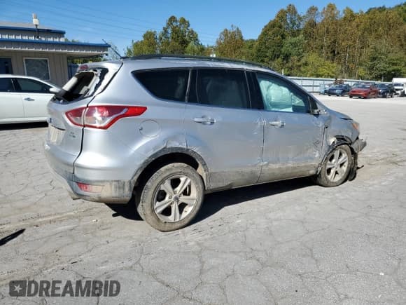 ✅ 2016 Ford Escape SE • VIN: 1FMCU9G97GUB10486 • Lot: 86306775. Listed on Copart with 162,692 mi. Free auction sales archive from the USA and detailed vehicle history report at DreamBid. Image 3.