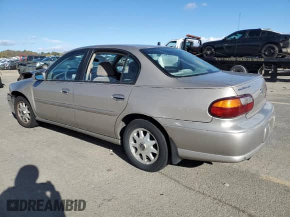 1999 Chevrolet Malibu LS z VIN 1G1NE52MXX6233064, wystawiony jako Copart lot #78757824 z przebiegiem 123 166 mil mil oraz Szkoda całkowita • Salvage title. Historia ofert i sprzedaży dostępna na DreamBid. Obrazek 2.