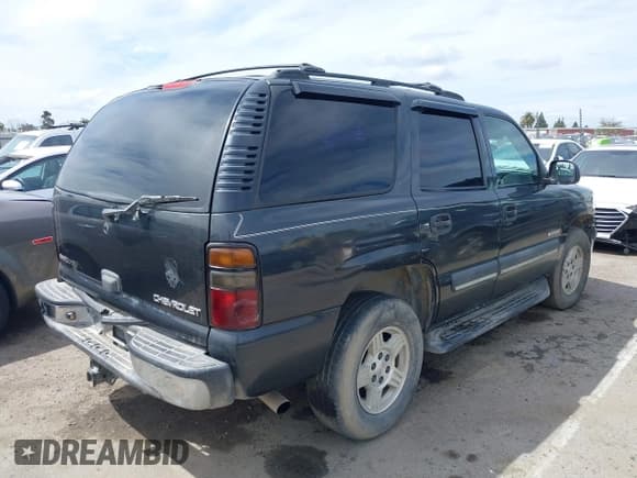 ✅ 2003 Chevrolet Tahoe LS • VIN: 1GNEC13T53R150900 • Lot: 39069588. Listed on IAAI with Not provided. Free auction sales archive from the USA and detailed vehicle history report at DreamBid. Image 4.
